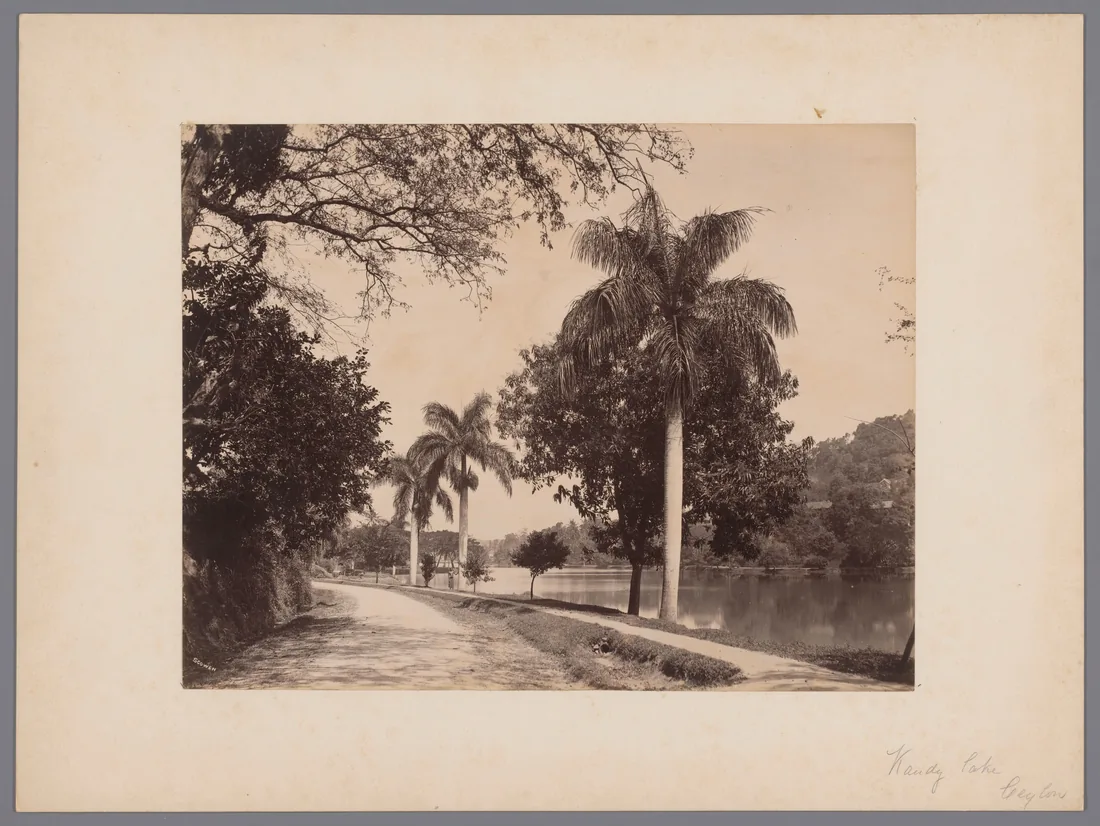 Albumen print by Charles Scowen, c.1870s–1880s, showing the lake at Kandy, Ceylon, the signature 'Scowen' in the negative at lower left.