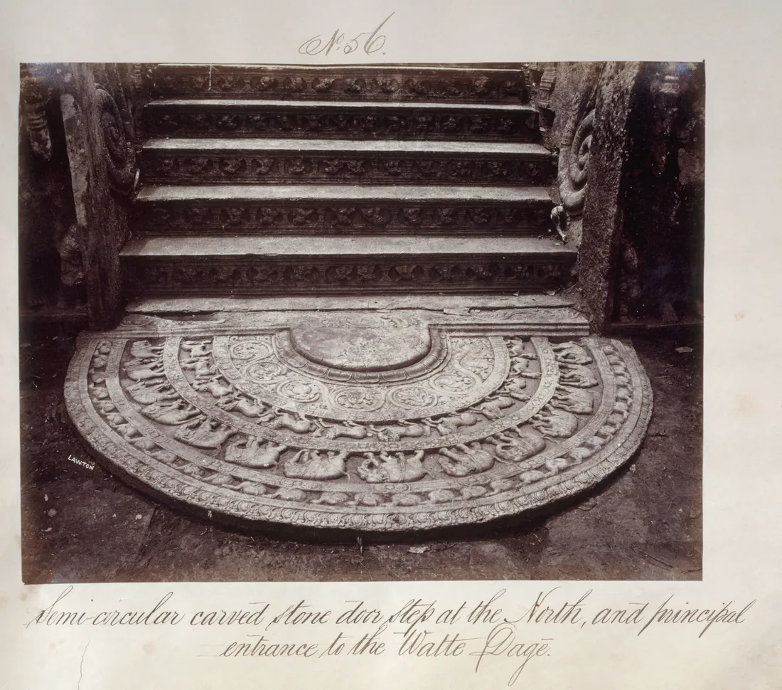 Joseph Lawton's albumen photograph of the carved semicircular moonstone at the north entrance to the Watadage at Polonnaruwa, Ceylon, a flight of worn stone steps rising behind it.