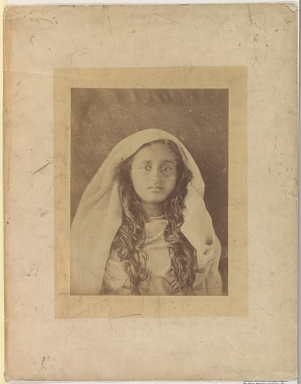 Julia Margaret Cameron's soft-focus albumen photograph of a young Ceylonese woman in a light head-veil.