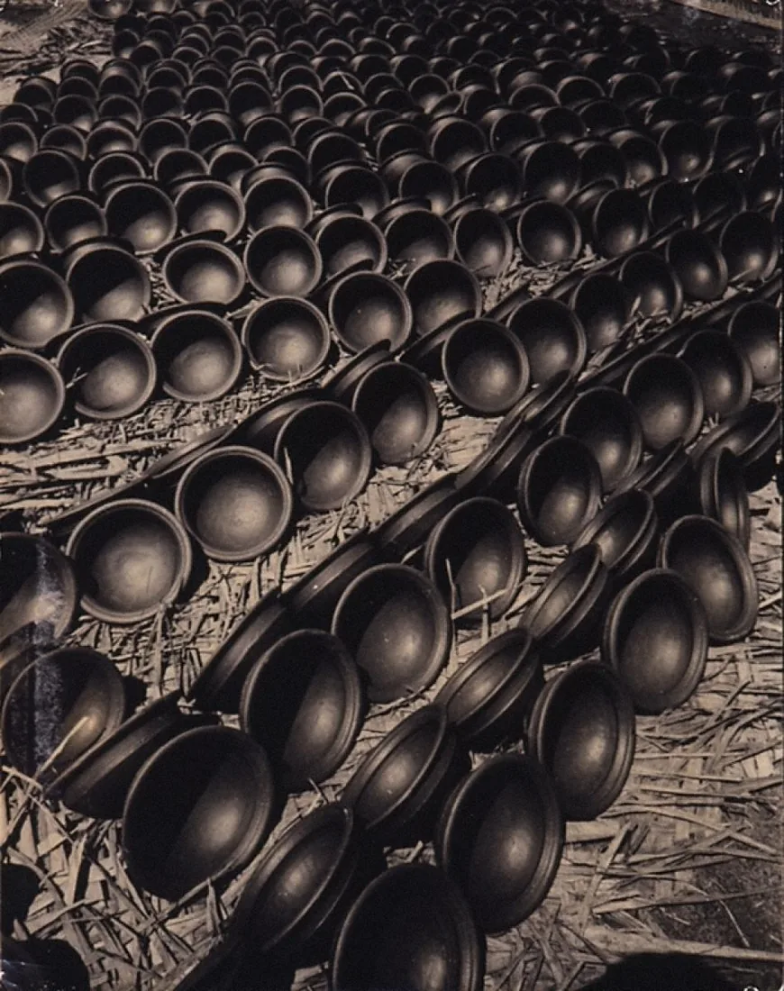 Lionel Wendt, Sun-baking Pottery III, a photograph of freshly thrown pots set out to dry in the sun.