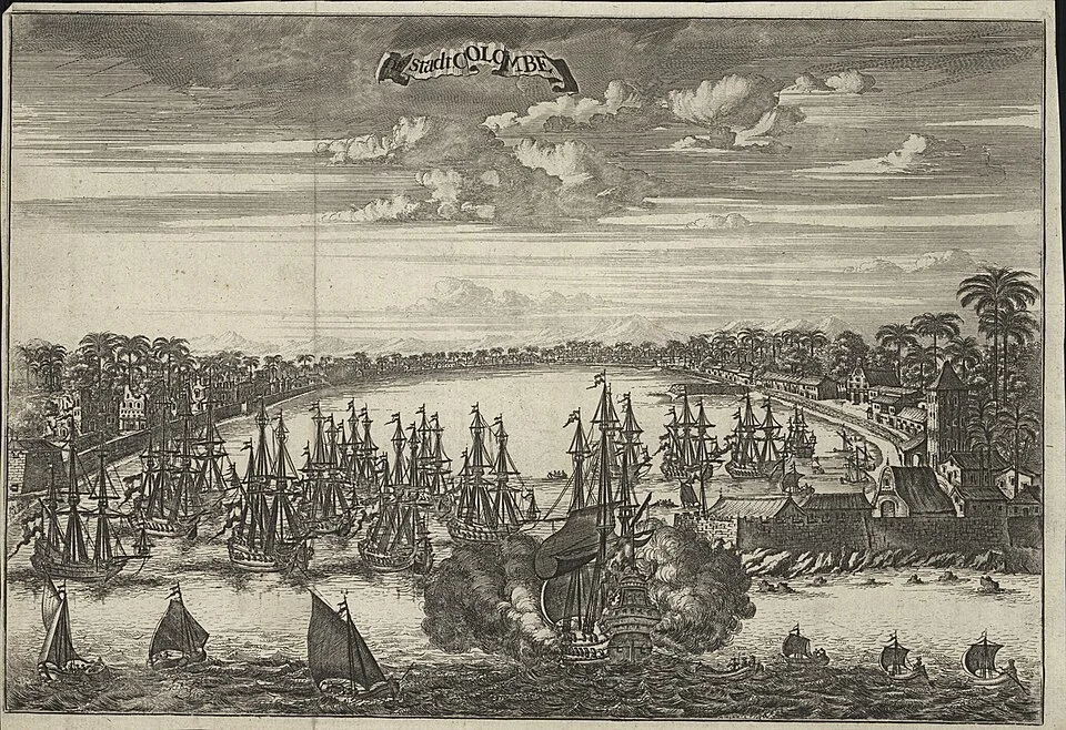 A 17th-century engraved harbour view of the city of Colombo, ships crowding the water before the fort and shore.