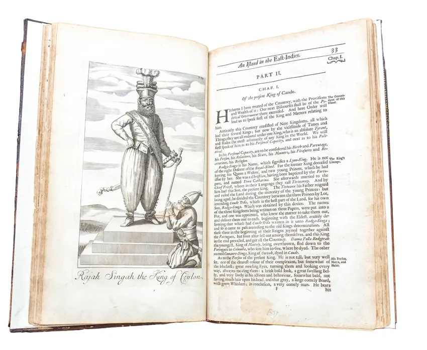 The 1681 first edition open to the engraving of Rajasingher, King of Ceylon, standing upon a dais.